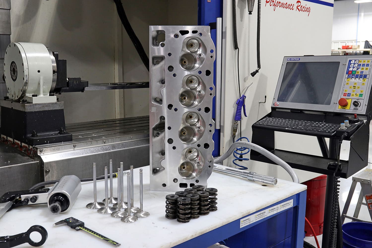 012 Bare aluminum cylinder head staged with valves and springs for high performance valvetrain assembly