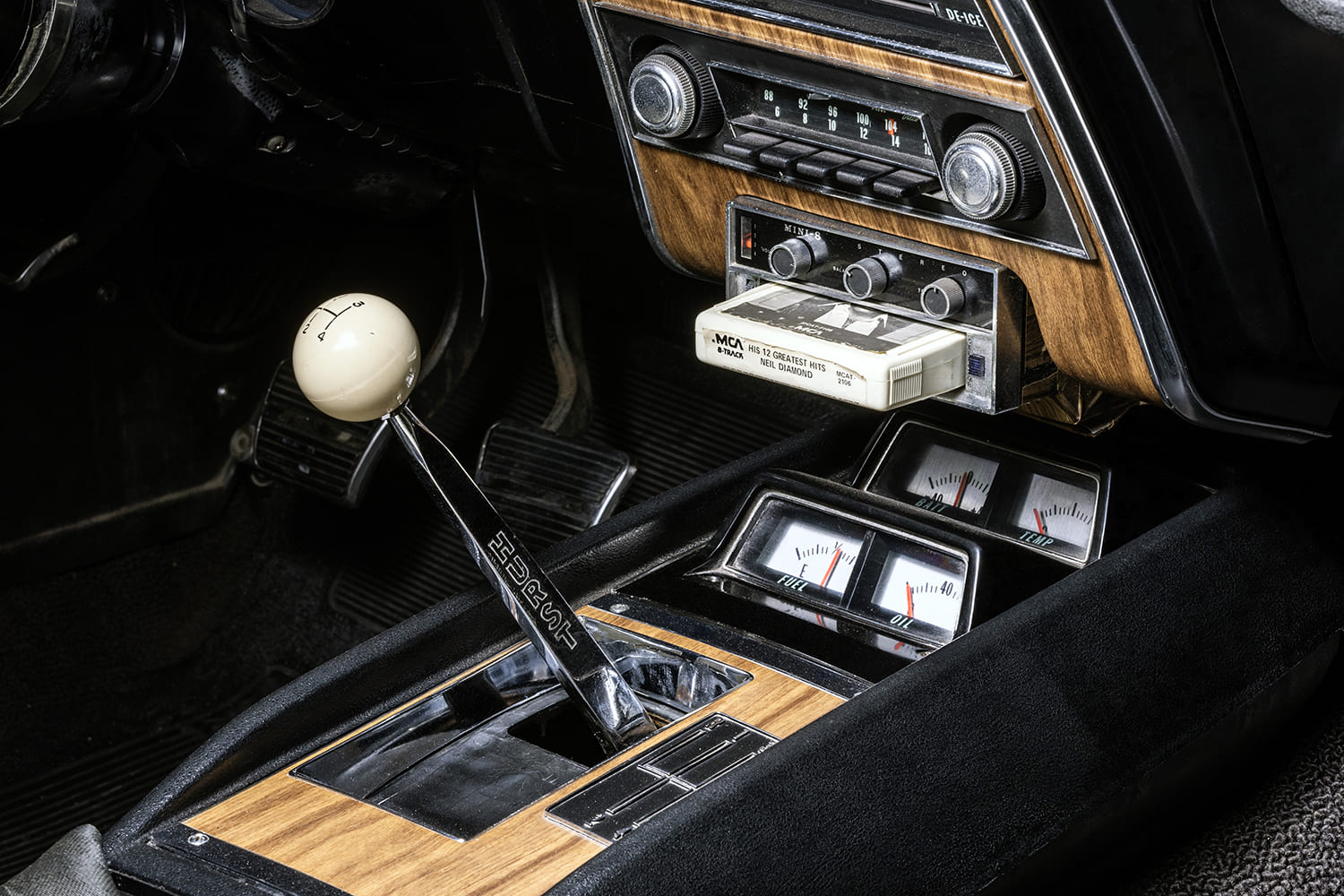014 1968 Chevrolet Camaro dash with Hurst shifter woodgrain panel and 8 track Neil Diamond tape