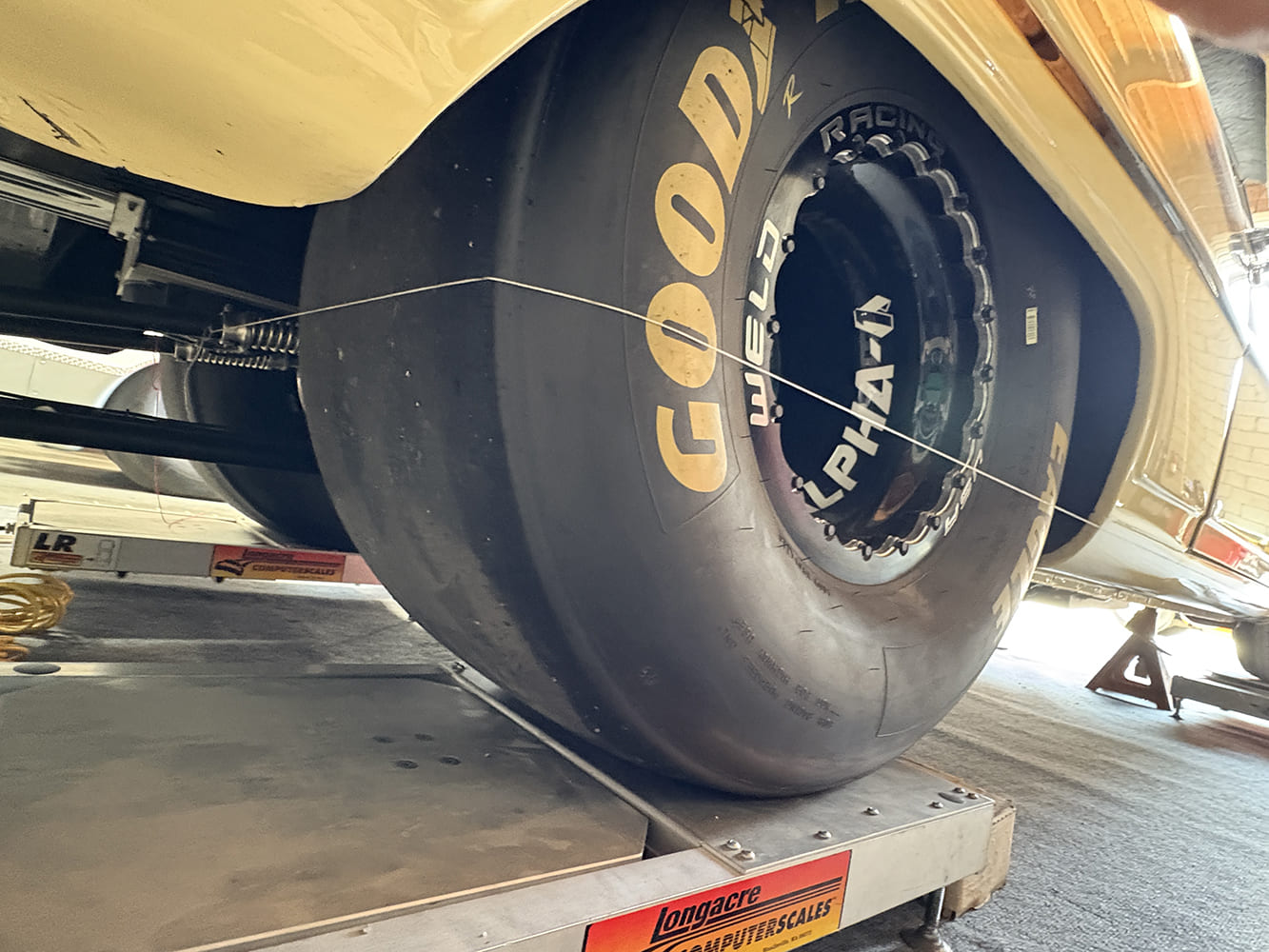 015 rear slick on longacre scale with alignment string for thrust check