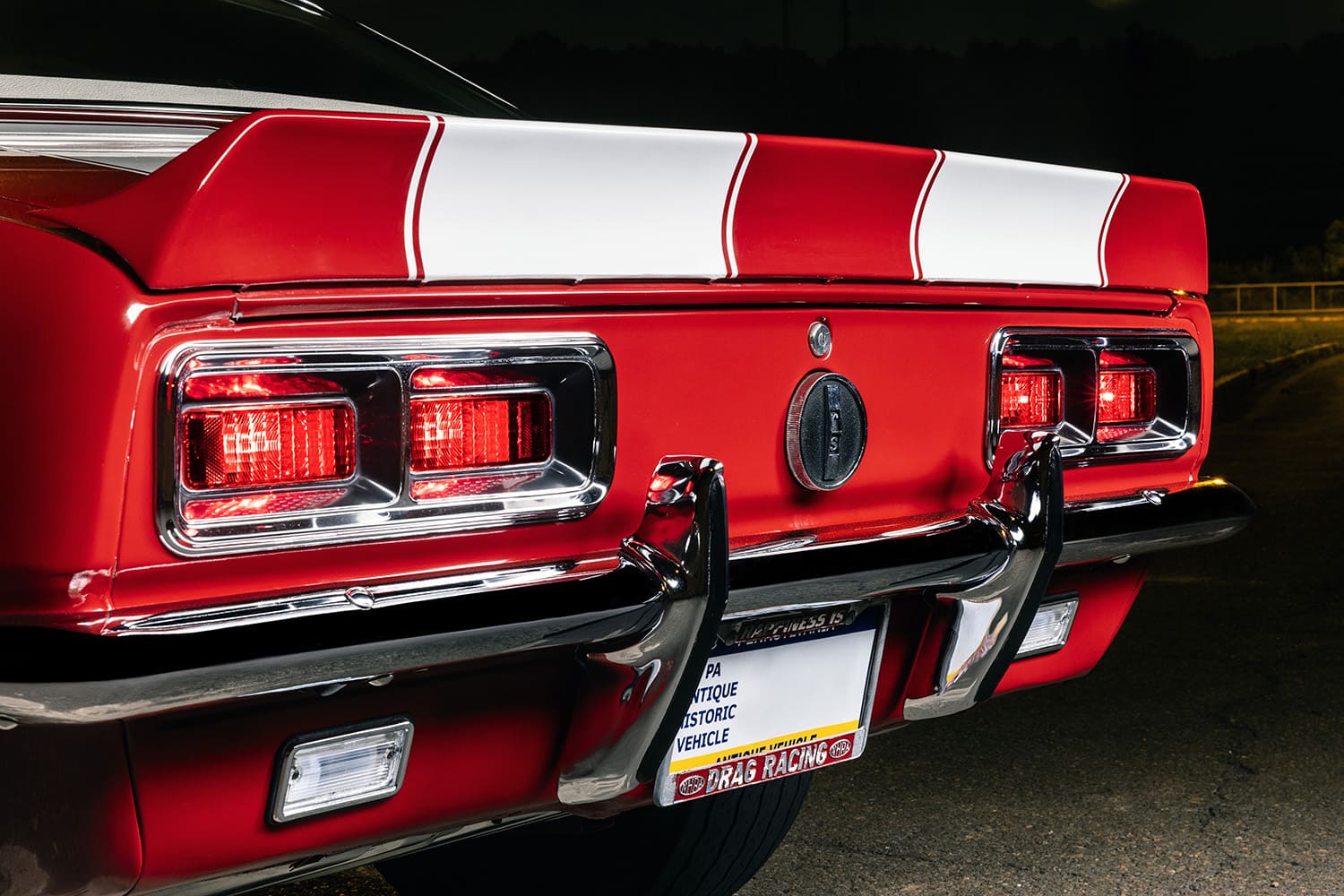 017 1968 Chevrolet Camaro rear taillight panel with white stripes and “RS” fuel cap emblem