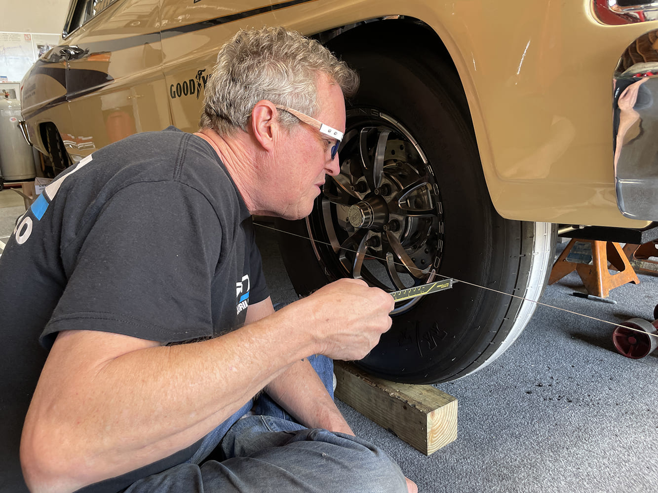 021 measuring toe with string and caliper on 1966 nova front slick