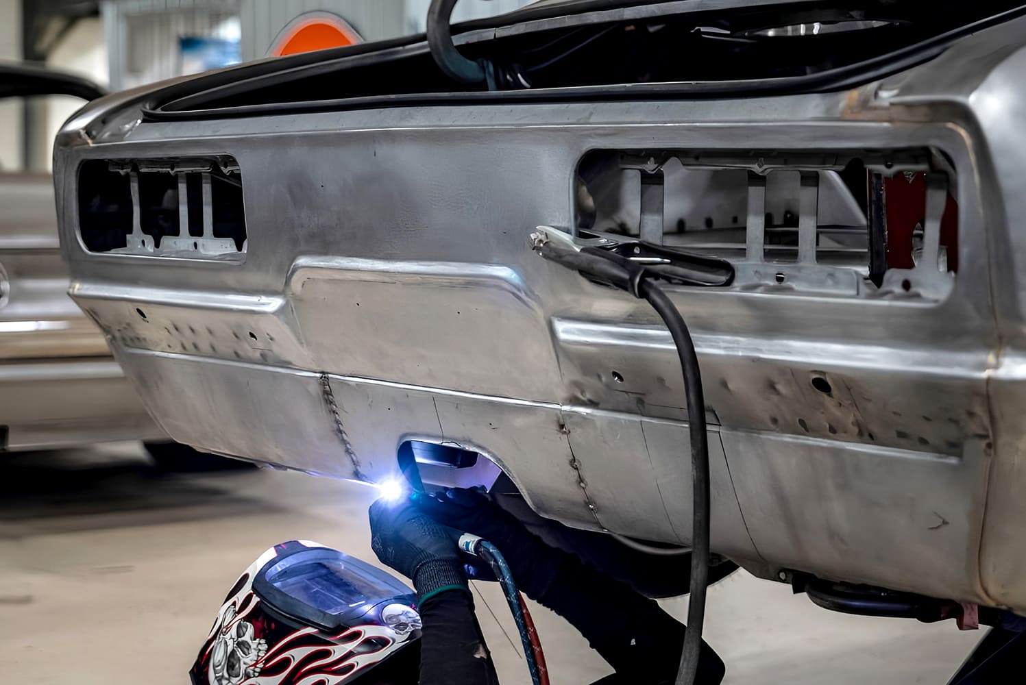 023 1968 Camaro smoothing welds on custom bumper delete panel with skull flame helmet