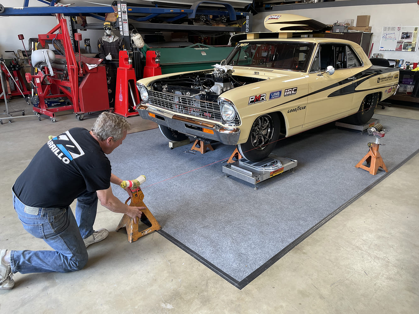025 aligning front thrust line using laser pointer on jack stand