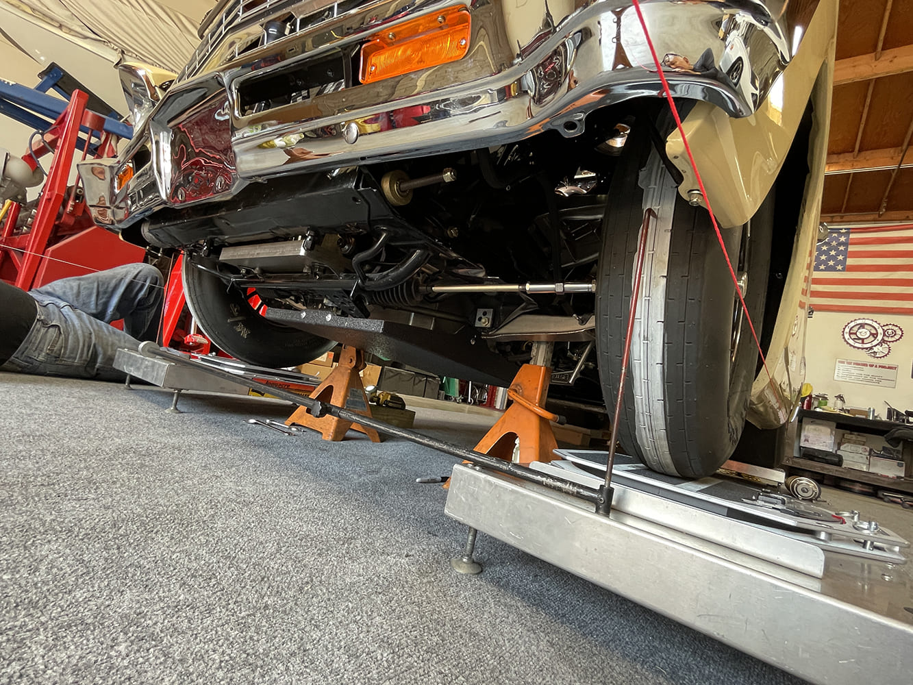 028 1966 nova front suspension visible during alignment with string bar