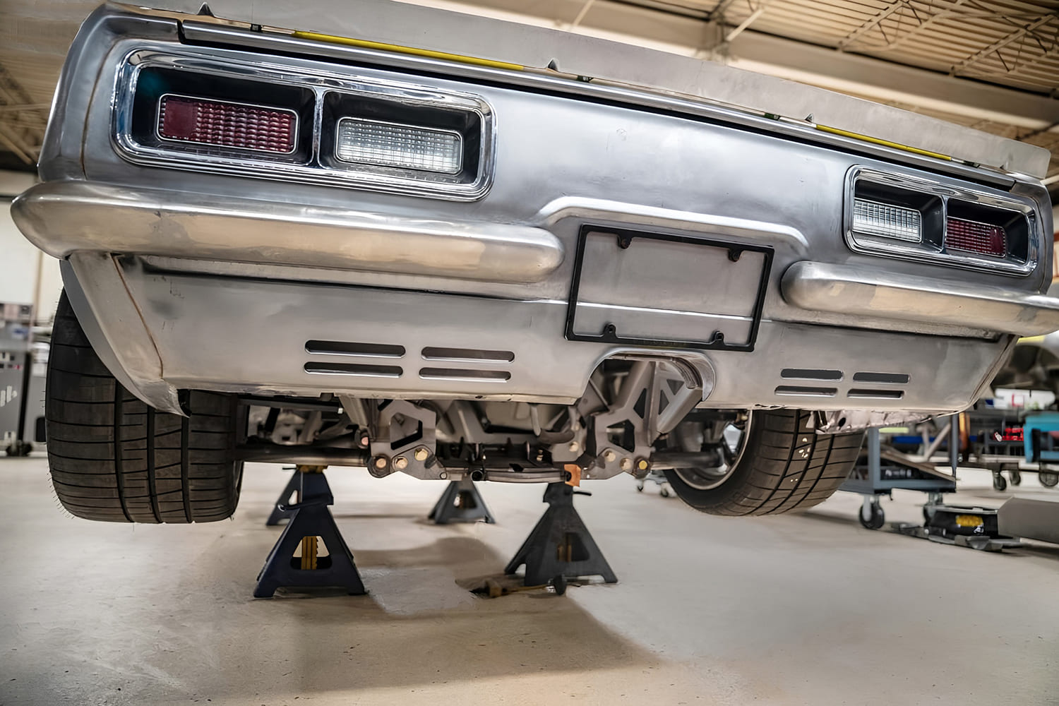 031 1968 Camaro rear bumper delete custom valance slotted vents quad link suspension on jack stands