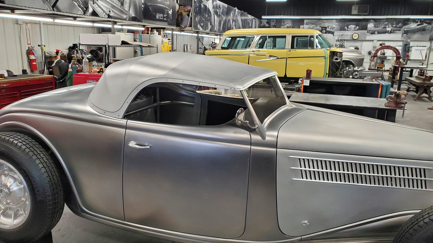 08 1936 Ford Roadster raw body with fitted roof panel metal shaping in progress custom top fabrication