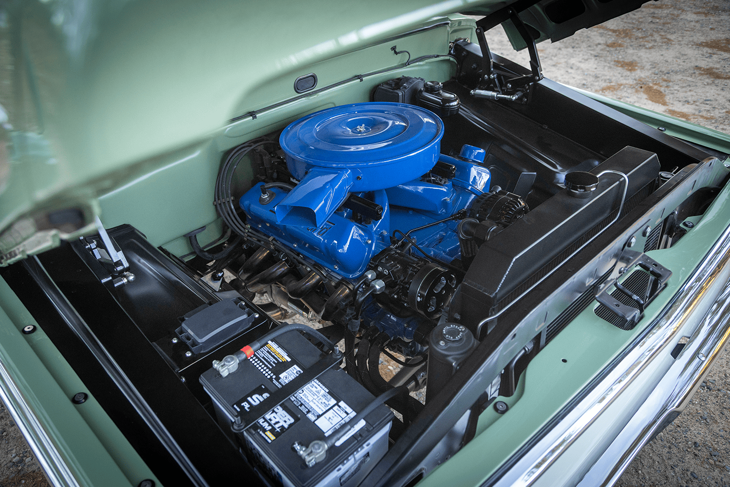 11 1969 Ford F 250 engine bay with blue Ford FE V8 Holley EFI and Power By Ford valve covers