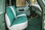 13 1969 Ford F 250 cab interior with green plaid bench seat white accents and original dash layout