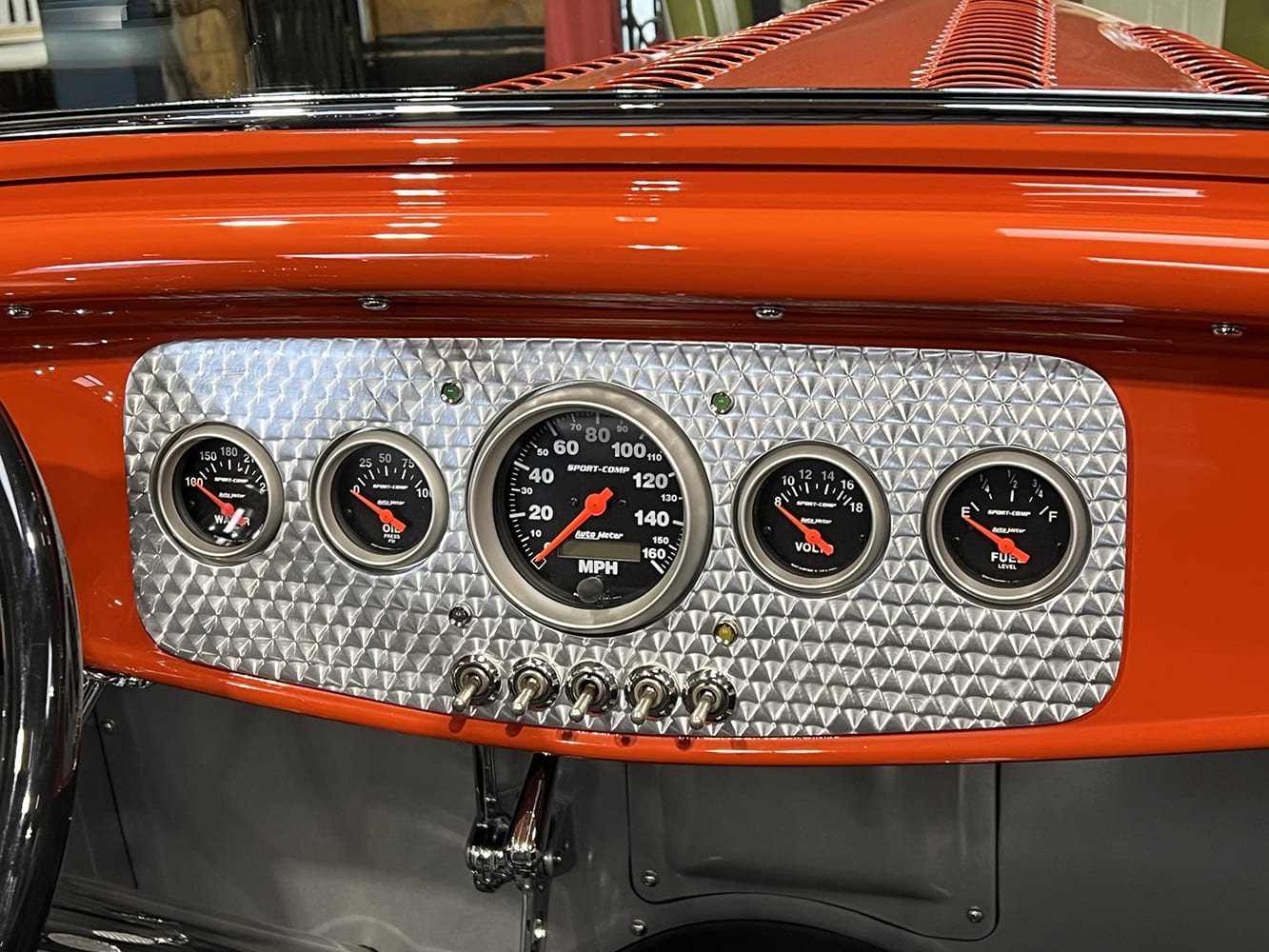 18 1932 Ford Roadster dash close up brushed aluminum panel red needles Autometer cluster