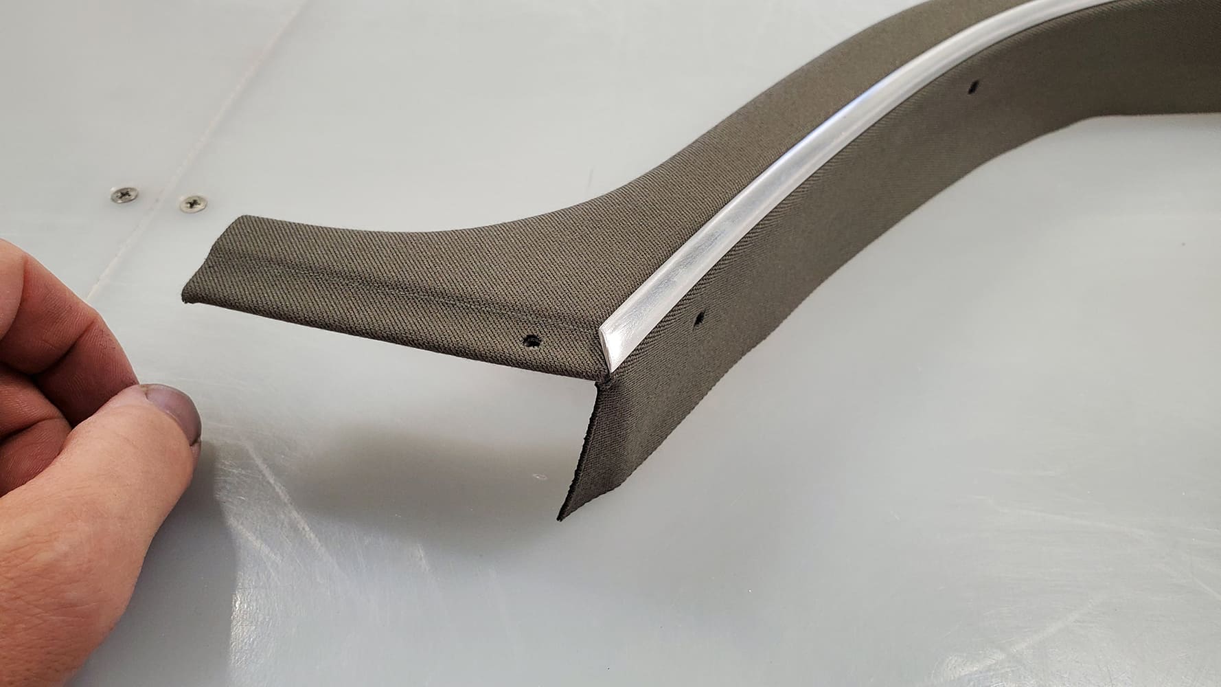 22 1936 Ford Roadster header bow wrapped in canvas with polished trim edge for finished convertible top