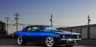 001 1969 Chevy Camaro blue restomod staggered wheels aggressive stance dusk lighting