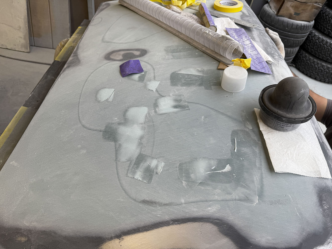 003 1963 Chevy Nova door skin in filler work block sanding stage