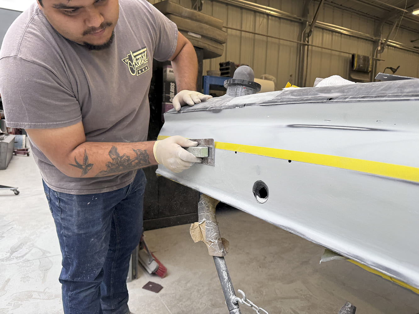 005 Bodyman block sanding 1963 Chevy Nova door with tape guide line