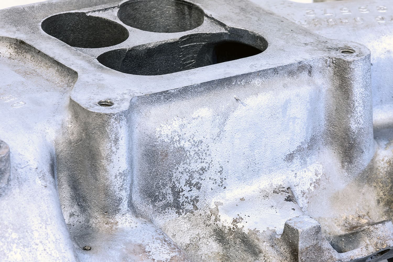 005 close up of oxidized aluminum and pitting from age