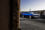 006 1969 Chevy Camaro street shot blue paint shop background evening glow
