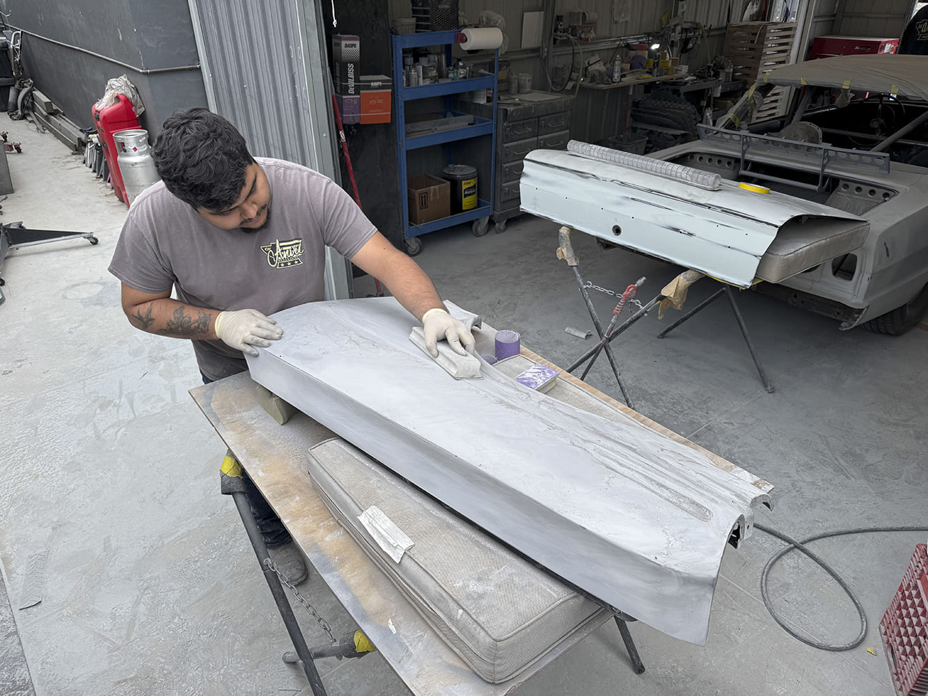 009 Bodyman block sanding primed 1963 Chevy Nova door skin