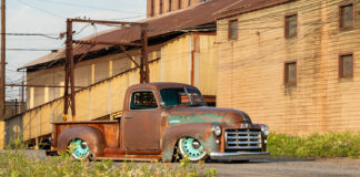 01 1948 GMC truck patina pickup lowered static stance vintage industrial backdrop