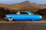 01 1953 Mercury Monterey profile shot air ride stance shaved trim and custom blue paint