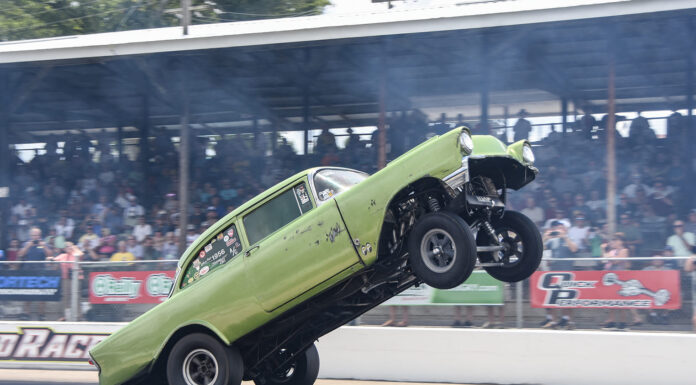 Three Days of Action at the 10th Annual Tri-Five Nationals Presented by CPP 01 1956 Chevy 210 gasser lime green wild wheelie launch straight axle high rev drag start