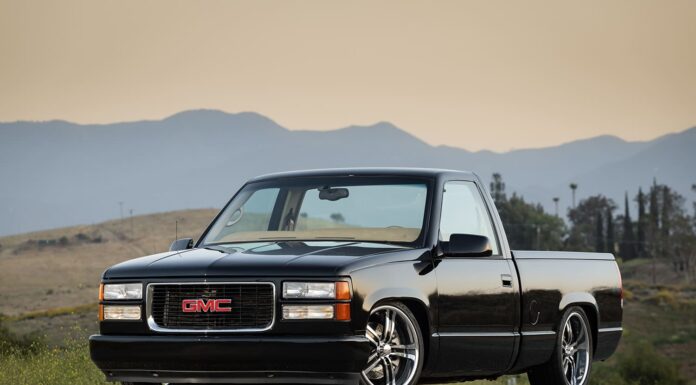 Terry Orsini’s 1998 GMC Sierra 01 1996 gmc obs truck black paint chrome wheels lowered stance clean front end with clear headlights