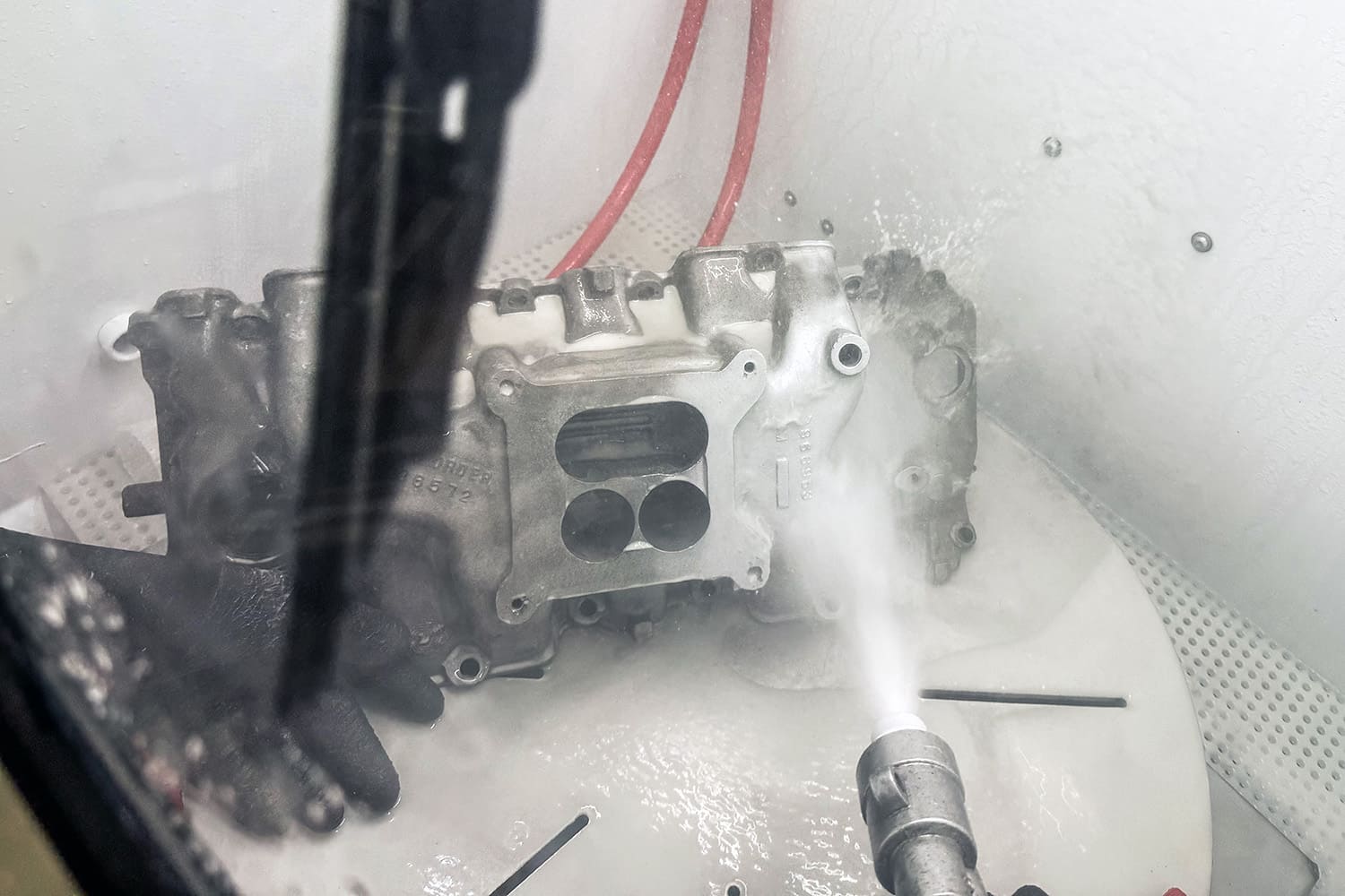 011 vapor honing in progress — blasting intake manifold