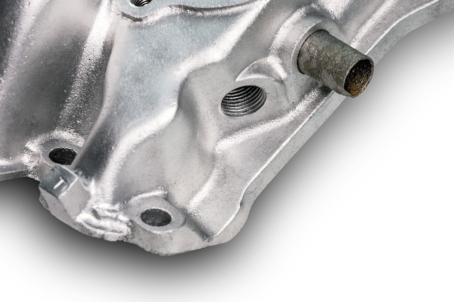 013 close up of heater hose nipple and clean casting