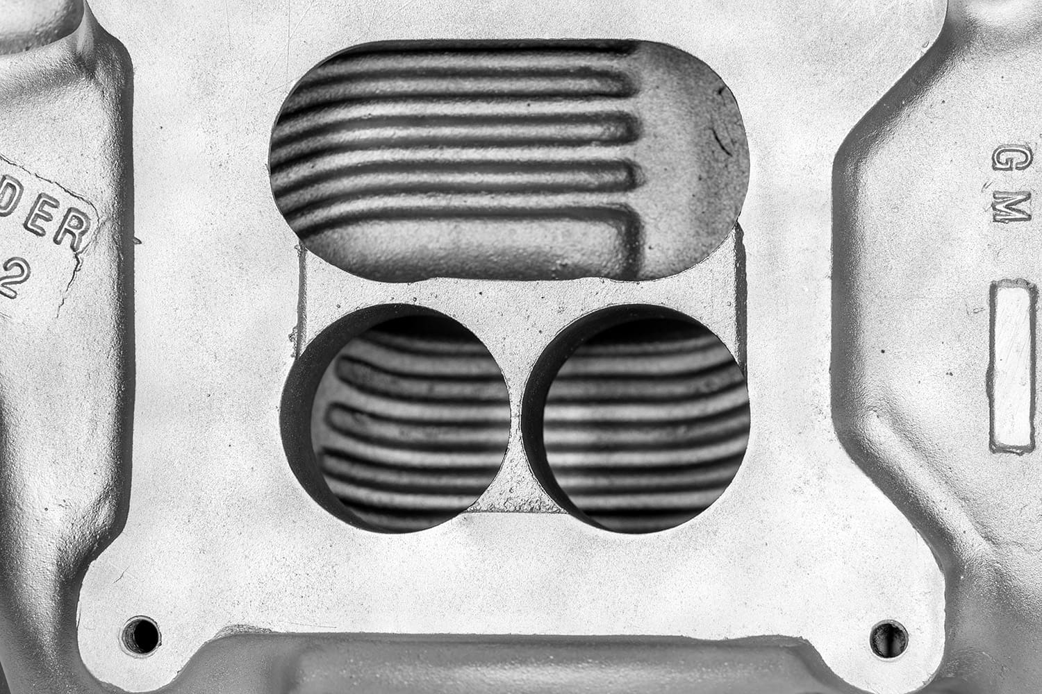 016 carb flange close up showing clean ridges