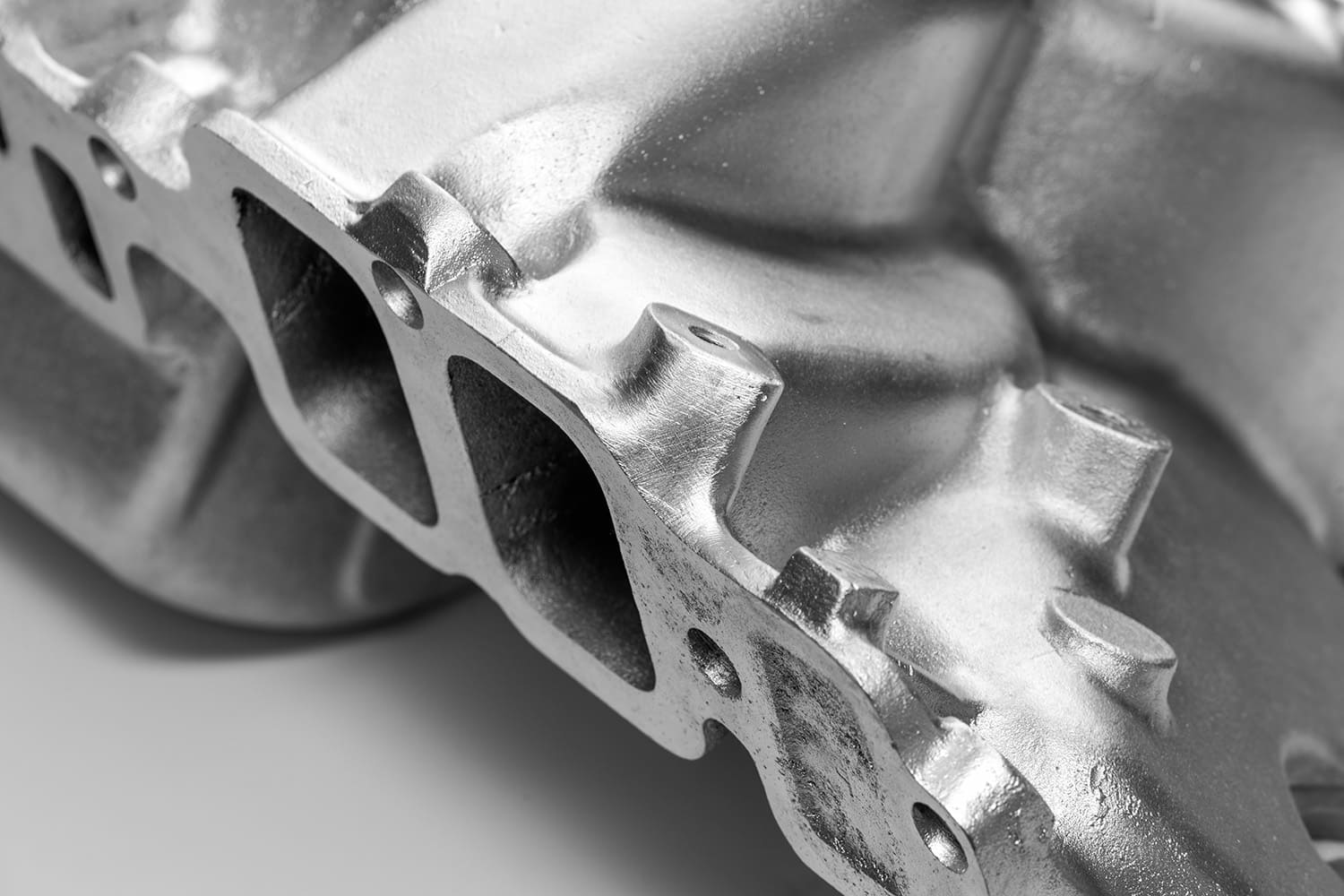 017 corner mounting ear and intake port detail