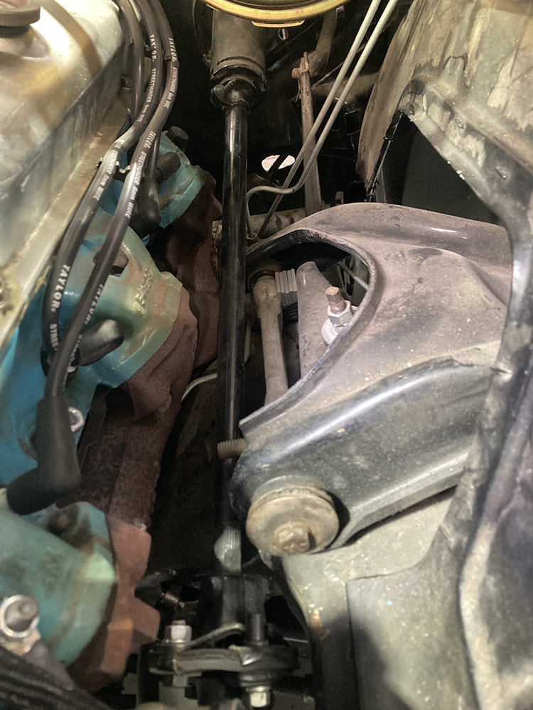 02 1964 Pontiac GTO steering shaft routing past headers and upper control arm with tight engine bay clearance