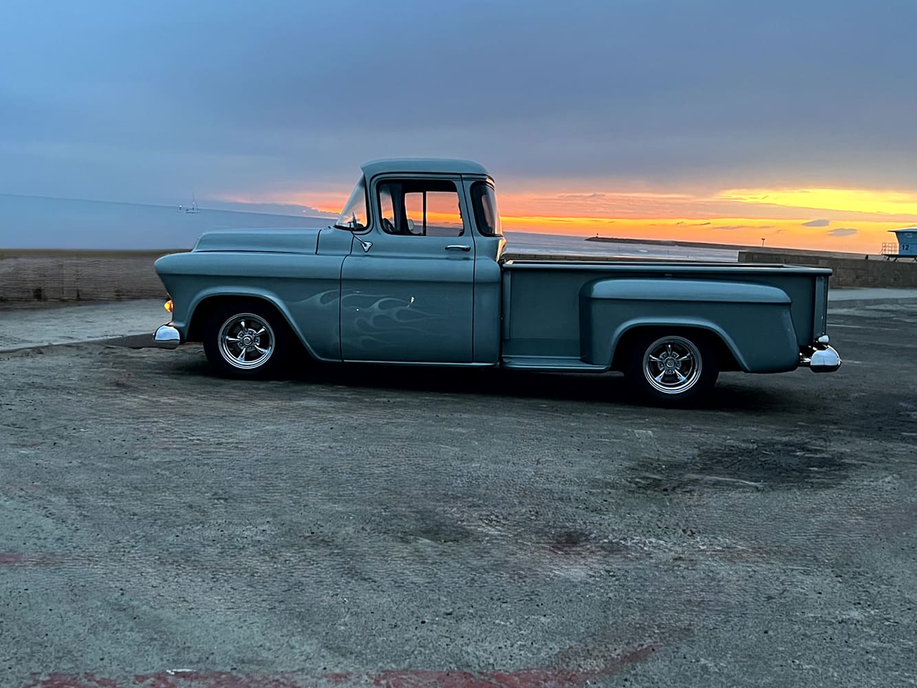 02 john nutt 1955 chevy 3200 sideview at sunset