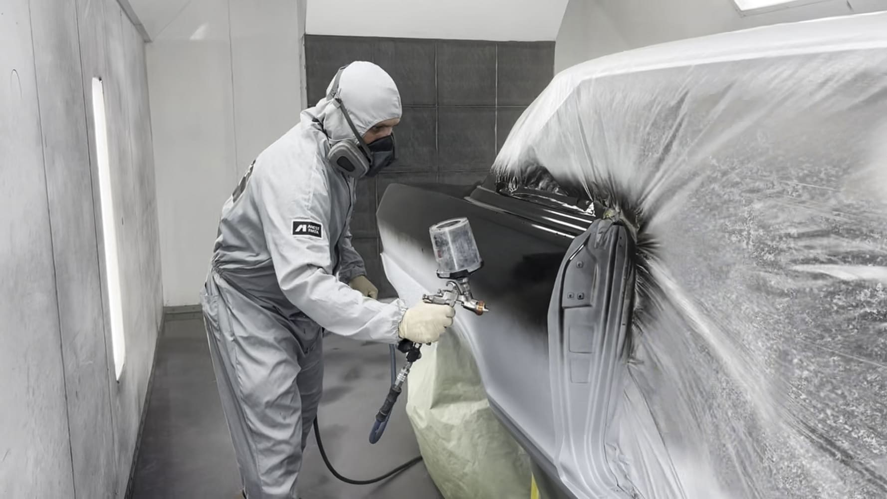 020 Painter spraying black base coat on 1963 Chevy Nova door