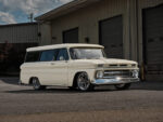 03 1966 Chevrolet Suburban three quarter profile with custom wheels lowered suspension and clean body panels