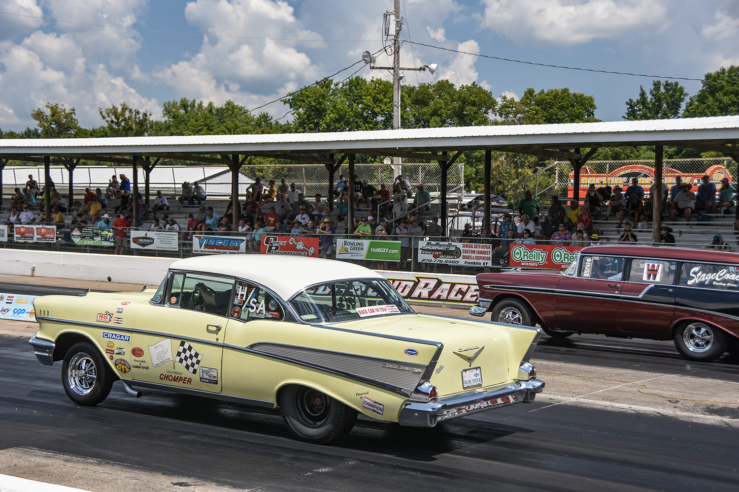 04 1957 Chevy Bel Air vs 1957 Ford Ranch Wagon drag race yellow “Chomper” side by side