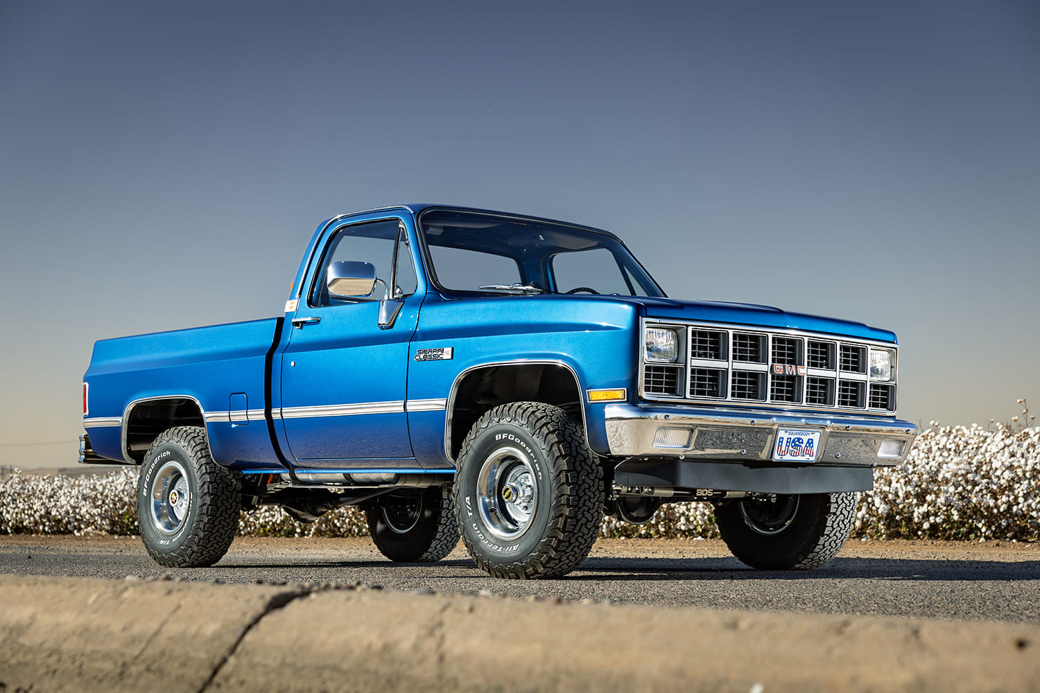 04 1981 gmc k15 low angle passenger side squarebody chrome mirrors blue paint