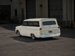 06 1966 GMC Suburban rear view showing license plate recess centered handle and factory style glass