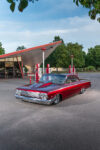 07 1962 Chevy Impala low front angle wide billet wheels candy red paint Vickers station