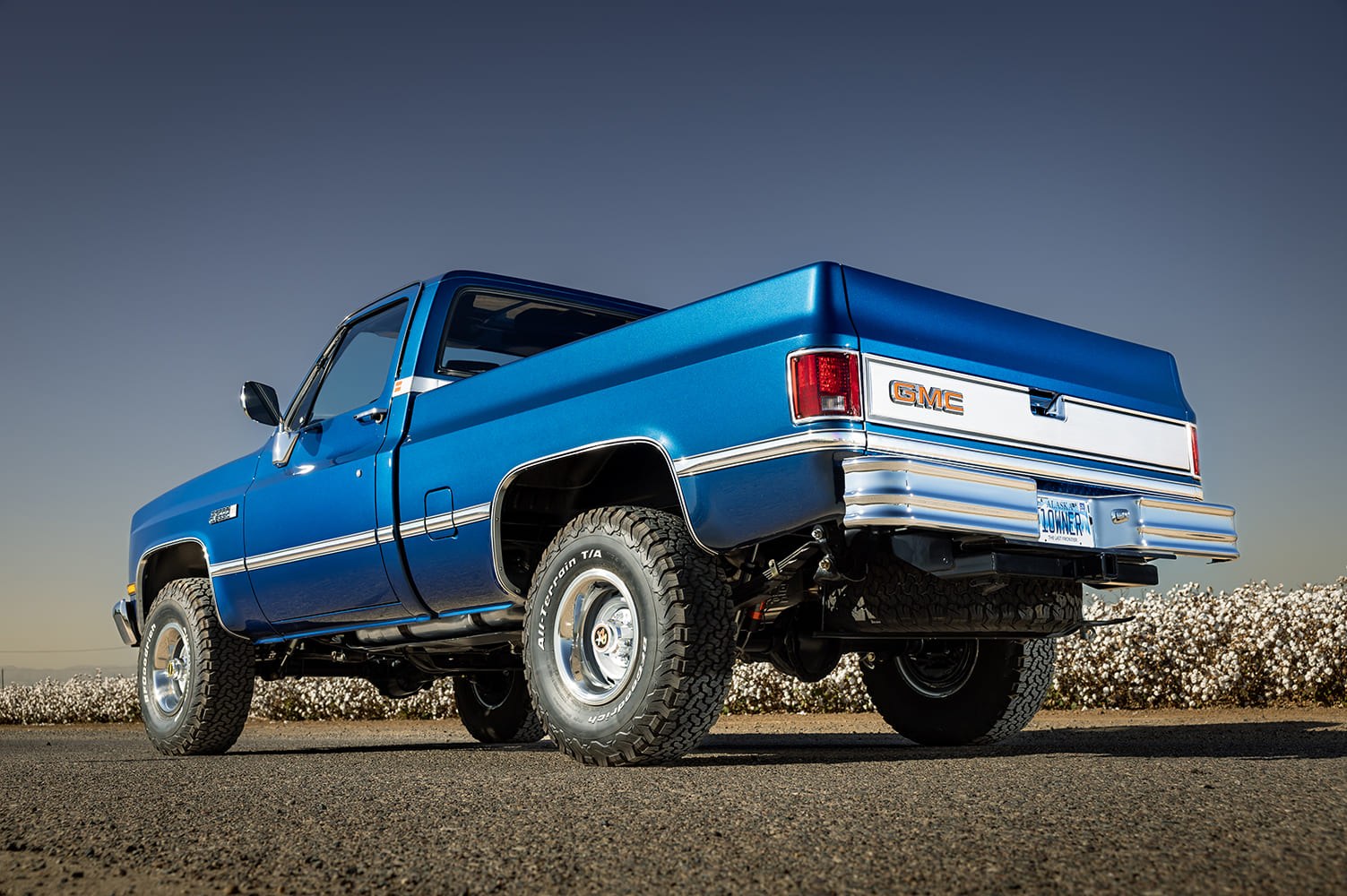 07 1981 gmc k15 low rear angle polished wheels lifted suspension all terrain tires