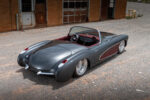 08 1956 Corvette C1 high angle rear shot with red interior and modern dash layout