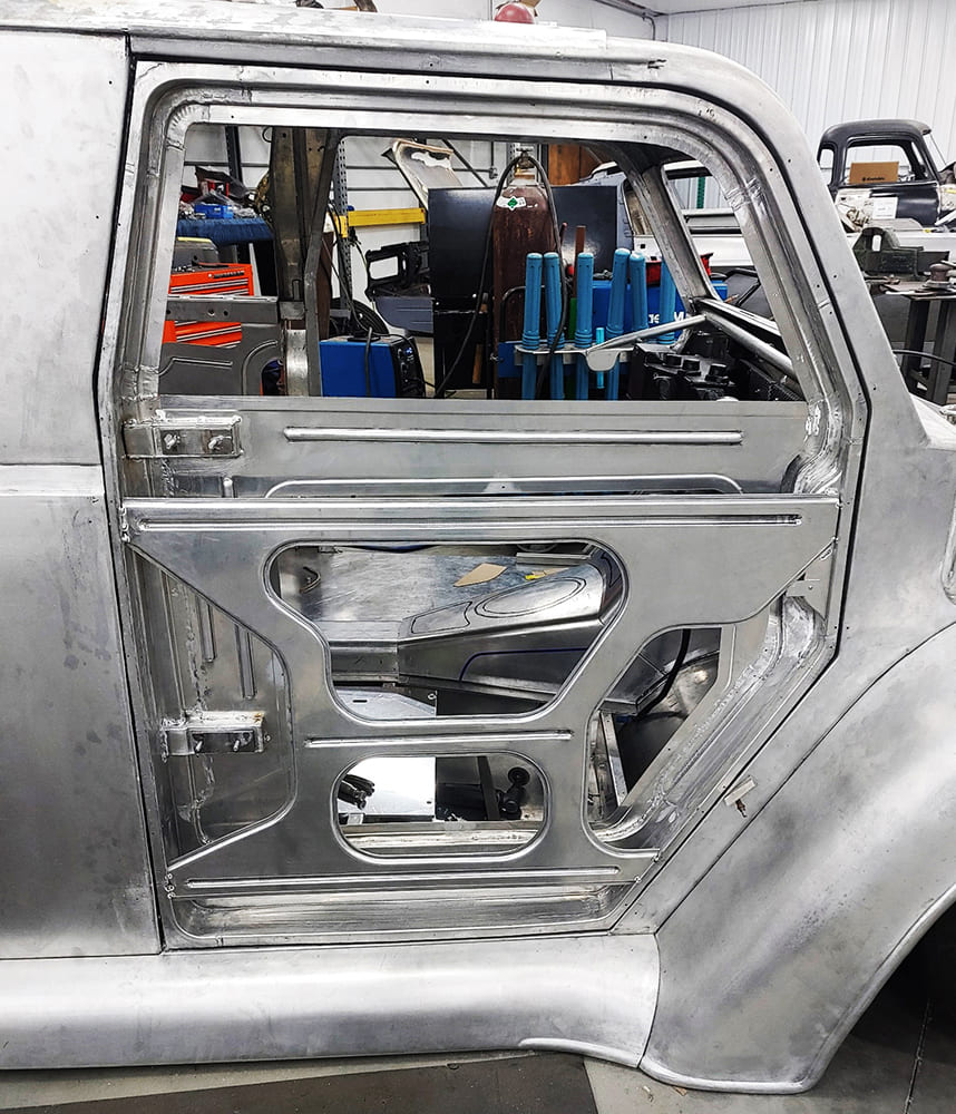 08 Divco custom driver side door structure hand formed with internal bracing and integrated window track