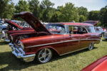 09 1957 Chevy Nomad candy red resto mod chrome wheels parked at Tri Five Nationals