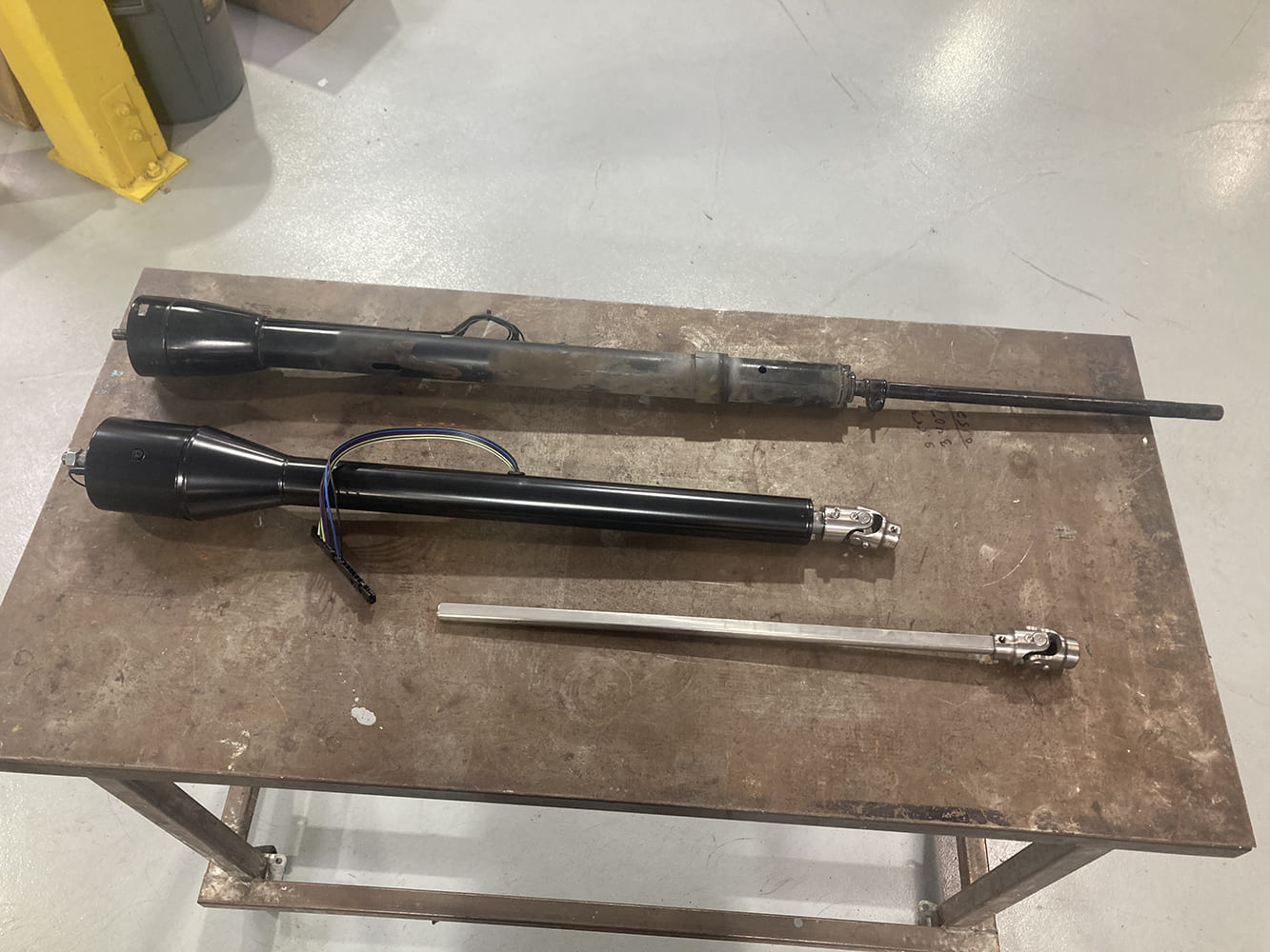 10 1964 Pontiac GTO steering column upgrade project showing full retrofit parts layout and fabrication planning