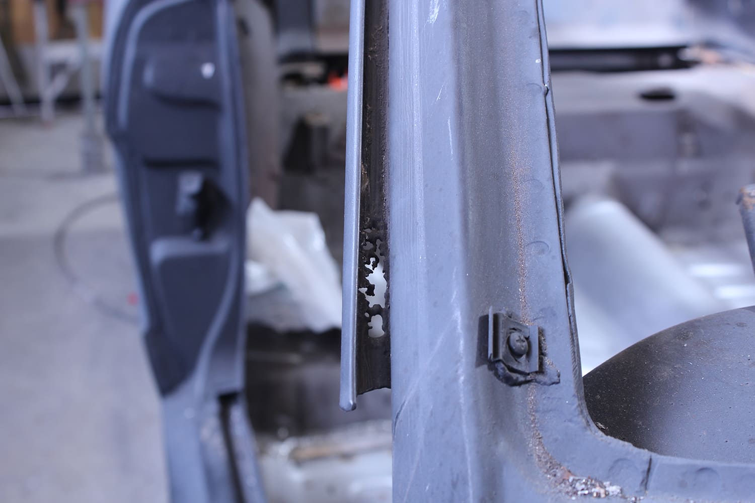 10 Significant rust through visible in original inner roof structure on '65 Mustang