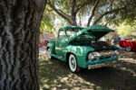 12 1955 Ford F 100 emerald green resto build whitewalls chrome trim under trees