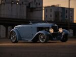 13 1932 Ford Roadster blue fenders down low light industrial sunset background