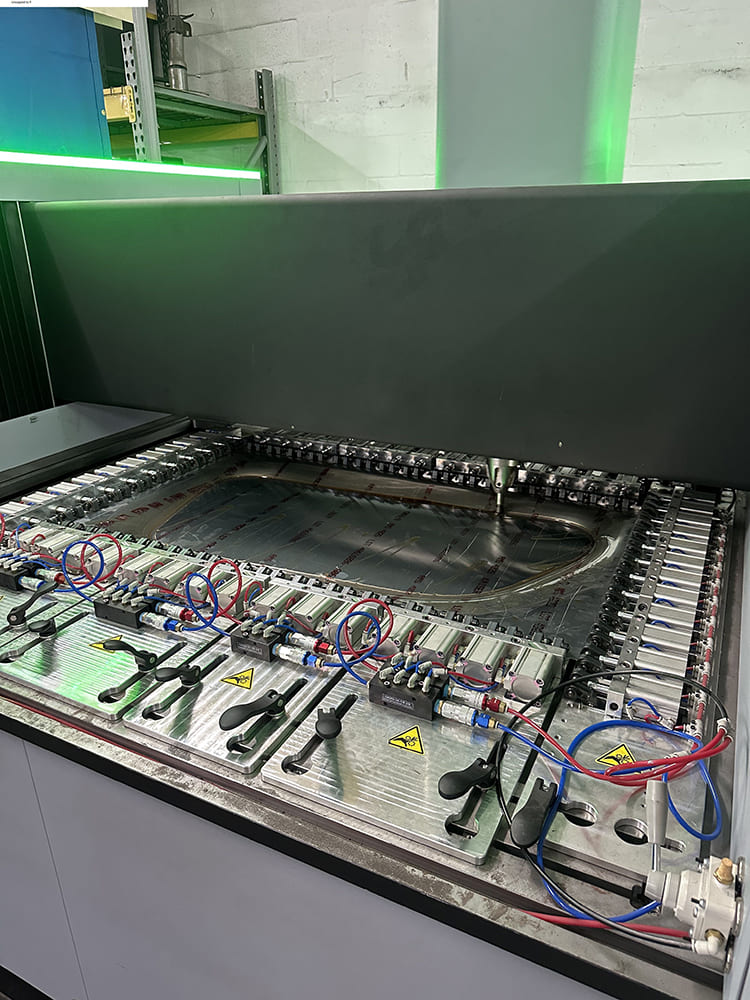 13 Divco hydroform press setup with window die and multi point fluid controls for precise shape transfer