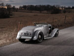 14 1932 Ford Roadster rear three quarter view raw steel black wheels nostalgia plates