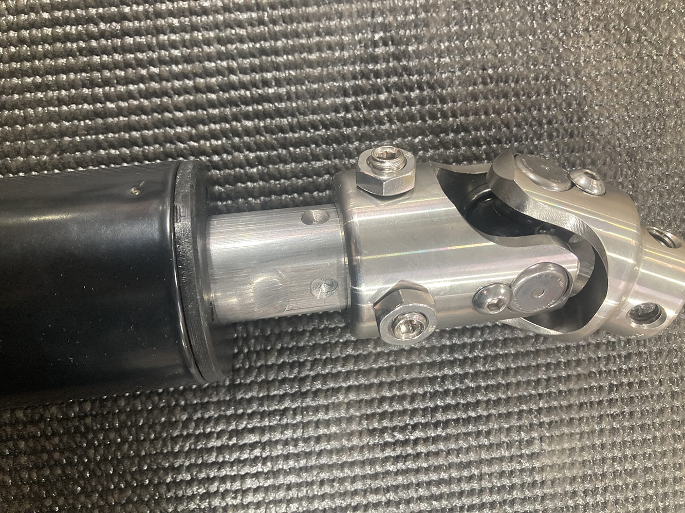 14 1964 Pontiac GTO black powder coated tilt column with stainless Borgeson style U joint attached