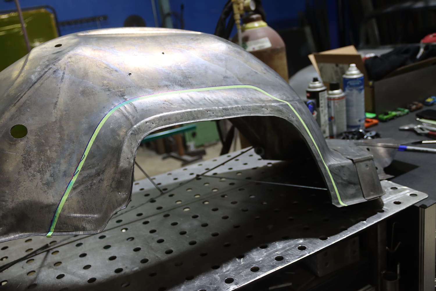 14 1967 Firebird factory wheel tub marked with cut lines for mini tub fabrication and clearance mod