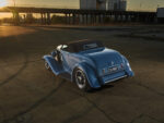 15 1932 Ford Roadster rear angle blue paint black top sunset industrial scene
