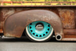 15 1948 GMC truck rear wheel closeup whitewall turquoise steelie patina fender